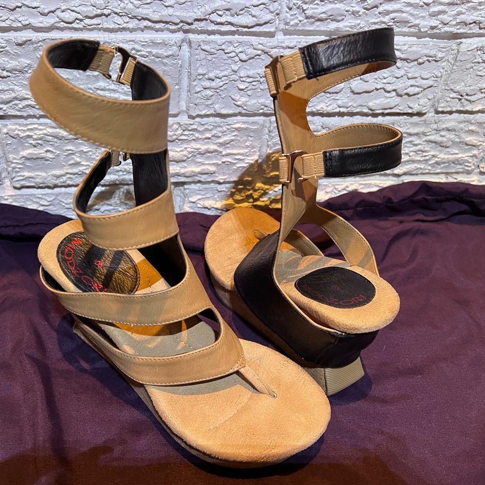 wedge sandal. Reversible color. One side tan or flip to make them black. New